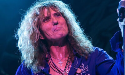 david coverdale on stage big hair purple shirt necklaces 710693251