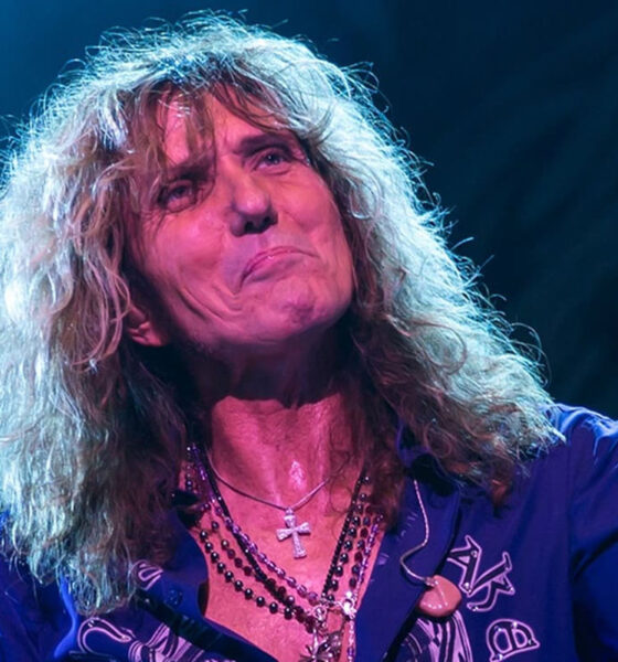 david coverdale on stage big hair purple shirt necklaces 710693251